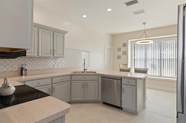 4731 N Crestline Dr, Beverly Hills, FL 34465 - kitchen featuring stainless steel dishwasher, a peninsula, backsplash, gray cabinets, and recessed lighting