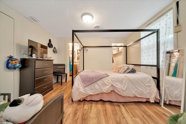 1322 NE 53rd St, Ocala, FL 34479 - bedroom featuring light wood-style floors
