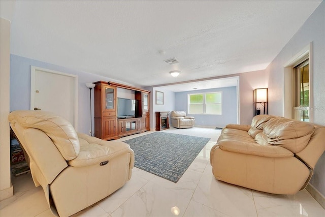 1322 NE 53rd St, Ocala, FL 34479 - living area with light marble finish floors and baseboards