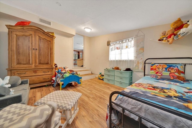 1322 NE 53rd St, Ocala, FL 34479 - bedroom featuring light wood-style floors