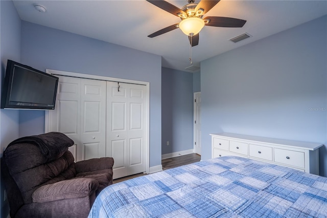 4015 SE 22nd St, Ocala, FL 34471 - bedroom featuring wood finished floors, a closet, baseboards, and ceiling fan