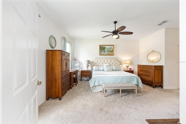 8303 SW 82nd Cir, Ocala, FL 34481 - bedroom featuring light colored carpet, ceiling fan, and baseboards