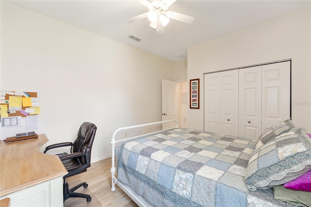 8303 SW 82nd Cir, Ocala, FL 34481 - bedroom with light wood-style floors, an office area, a closet, a ceiling fan, and baseboards