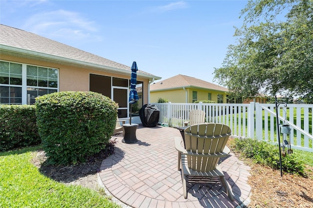 8303 SW 82nd Cir, Ocala, FL 34481 - view of patio / terrace featuring a sunroom