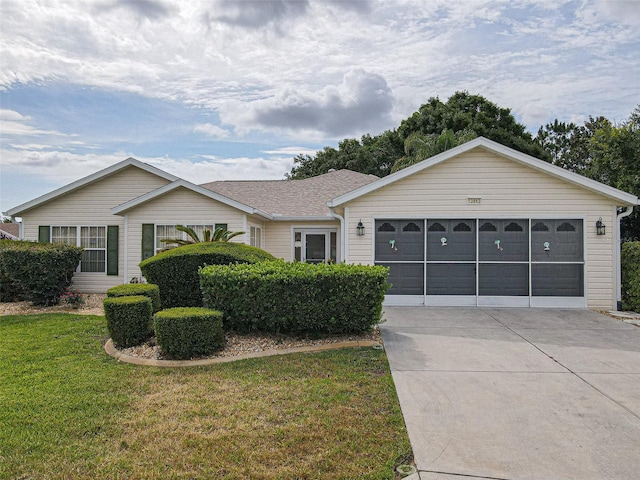 13863 SE 85th Cir, Summerfield, FL 34491 - single story home with a front yard, driveway, and a garage