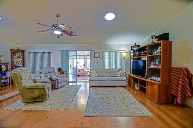 13863 SE 85th Cir, Summerfield, FL 34491 - living area with a ceiling fan and wood finished floors
