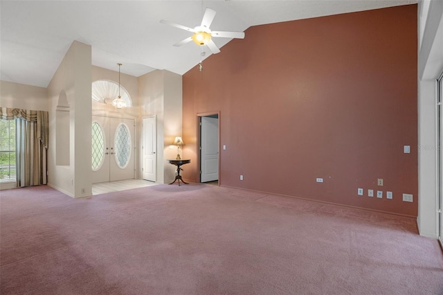 11 Calendula Ct E, Homosassa, FL 34446 - foyer with high vaulted ceiling, light colored carpet, baseboards, and a ceiling fan