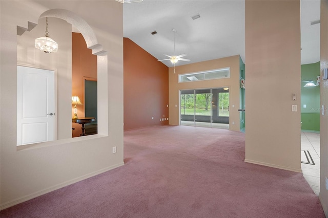 11 Calendula Ct E, Homosassa, FL 34446 - unfurnished room featuring high vaulted ceiling, carpet floors, arched walkways, baseboards, and a ceiling fan
