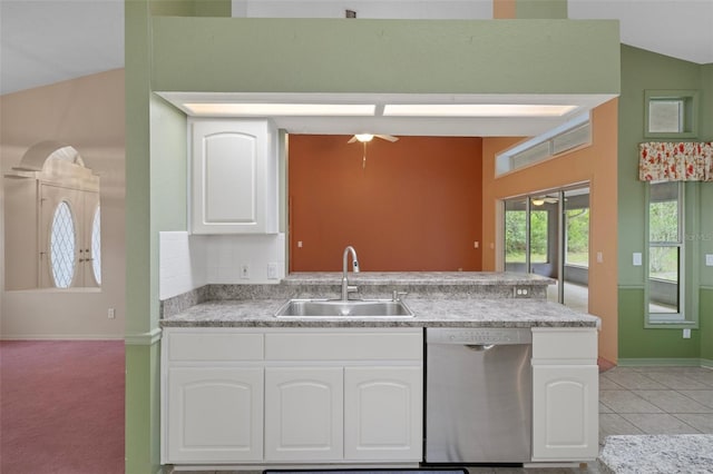 11 Calendula Ct E, Homosassa, FL 34446 - kitchen with dishwasher, a sink, baseboards, white cabinetry, and a ceiling fan