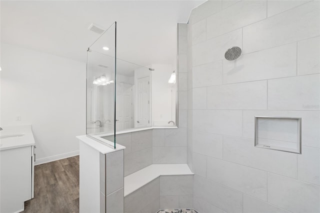 10553 SW 98th Pl, Ocala, FL 34481 - full bath featuring walk in shower, vanity, and wood finished floors