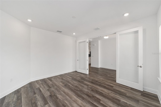 10553 SW 98th Pl, Ocala, FL 34481 - spare room with dark wood-style floors, recessed lighting, and baseboards