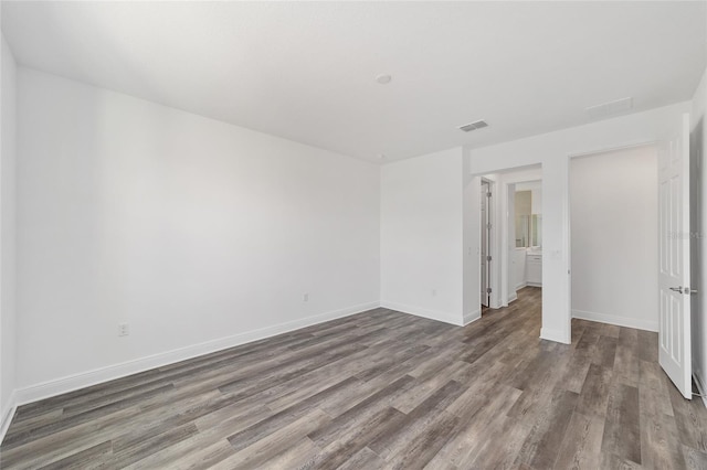 10553 SW 98th Pl, Ocala, FL 34481 - spare room with wood finished floors and baseboards