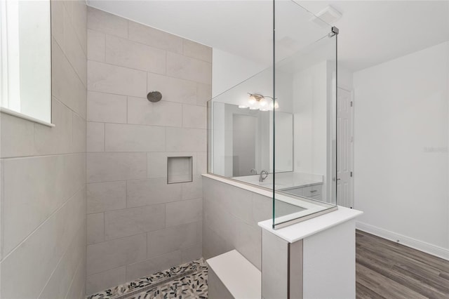 10553 SW 98th Pl, Ocala, FL 34481 - full bath with a walk in shower and wood finished floors