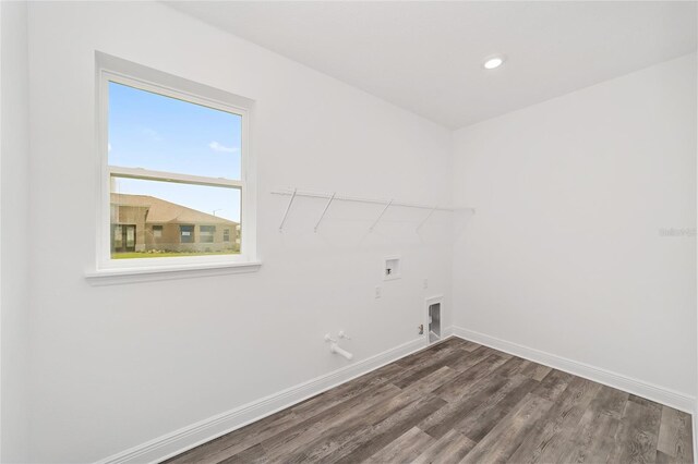 10553 SW 98th Pl, Ocala, FL 34481 - washroom featuring dark wood-style floors, gas dryer hookup, baseboards, hookup for a washing machine, and recessed lighting