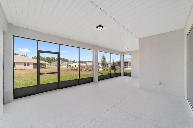 10553 SW 98th Pl, Ocala, FL 34481 - unfurnished sunroom featuring a residential view