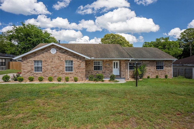 3295 SE 56th Ave, Ocala, FL 34480 - single story home featuring brick siding and roof with shingles