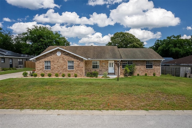 3295 SE 56th Ave, Ocala, FL 34480 - single story home with brick siding and a shingled roof