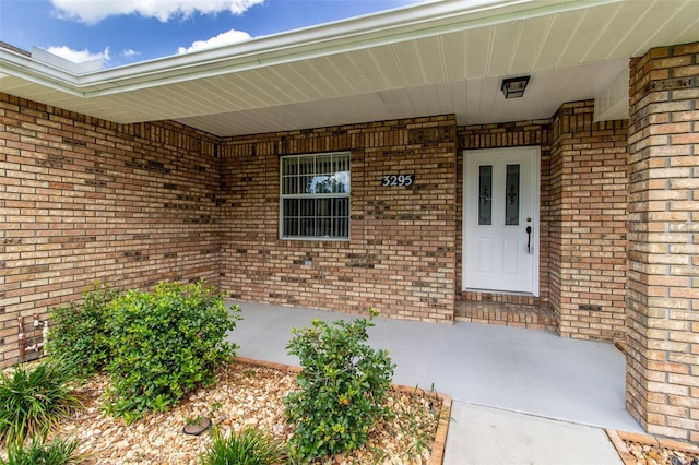 3295 SE 56th Ave, Ocala, FL 34480 - doorway to property with brick siding