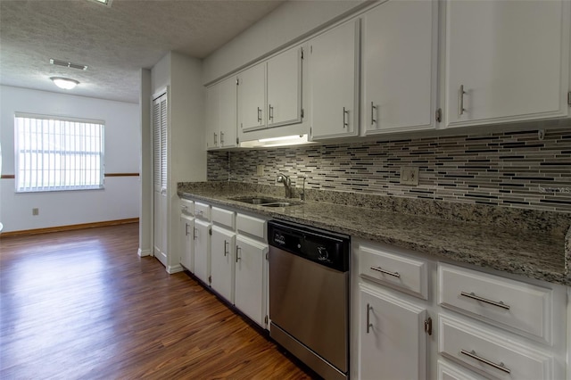 3295 SE 56th Ave, Ocala, FL 34480 - kitchen featuring dishwasher, a sink, dark wood finished floors, a textured ceiling, and tasteful backsplash