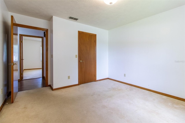 3295 SE 56th Ave, Ocala, FL 34480 - unfurnished room with light carpet and baseboards