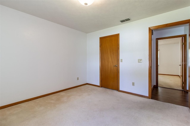 3295 SE 56th Ave, Ocala, FL 34480 - unfurnished bedroom featuring light carpet and baseboards