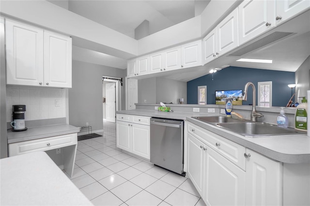 8015 N Tower Way, Citrus Springs, FL 34434 - kitchen featuring dishwasher, a sink, light countertops, lofted ceiling, and decorative backsplash