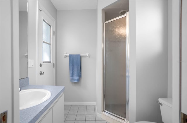 8015 N Tower Way, Citrus Springs, FL 34434 - bathroom featuring vanity, a shower stall, toilet, and tile patterned flooring