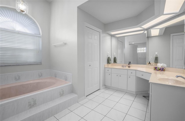 8015 N Tower Way, Citrus Springs, FL 34434 - full bathroom featuring double vanity, tile patterned flooring, and a garden tub