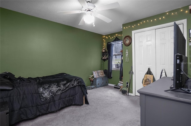8015 N Tower Way, Citrus Springs, FL 34434 - carpeted bedroom featuring ceiling fan, a closet, and baseboards