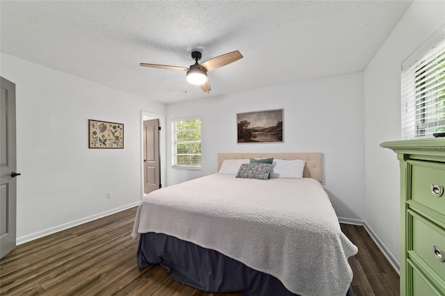 4601 SE 18th Ave, Ocala, FL 34480 - bedroom with dark wood-type flooring, baseboards, ceiling fan, and a textured ceiling