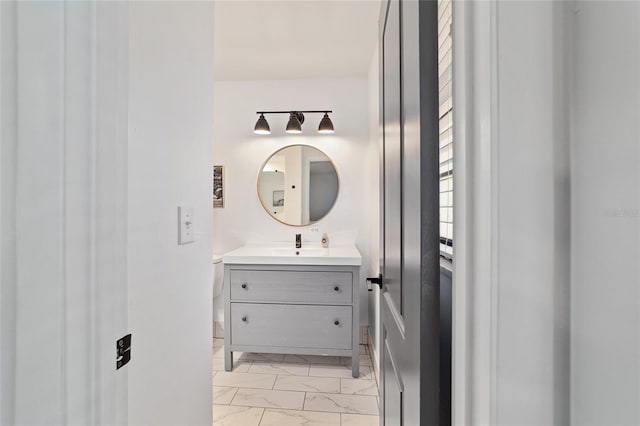 4601 SE 18th Ave, Ocala, FL 34480 - bathroom featuring marble finish floors and vanity
