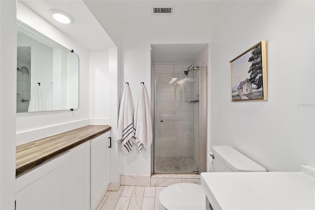 4601 SE 18th Ave, Ocala, FL 34480 - bathroom featuring toilet, vanity, marble finish floors, and a shower stall