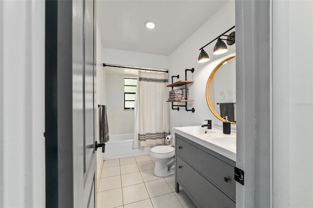 4601 SE 18th Ave, Ocala, FL 34480 - bathroom featuring toilet, double vanity, shower / tub combo with curtain, and tile patterned floors