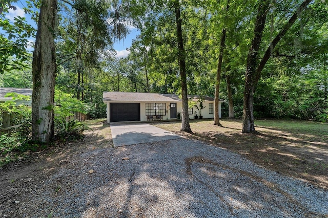 4601 SE 18th Ave, Ocala, FL 34480 - view of front of property featuring driveway and a garage