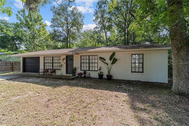 4601 SE 18th Ave, Ocala, FL 34480 - view of front facade with concrete driveway, a garage, and concrete block siding