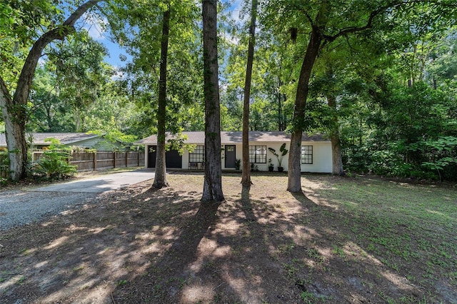 4601 SE 18th Ave, Ocala, FL 34480 - single story home with driveway and an attached garage