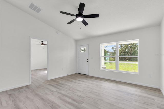 5701 NW 6th Pl, Ocala, FL 34482 - entryway featuring a ceiling fan, vaulted ceiling, light wood-style flooring, and baseboards