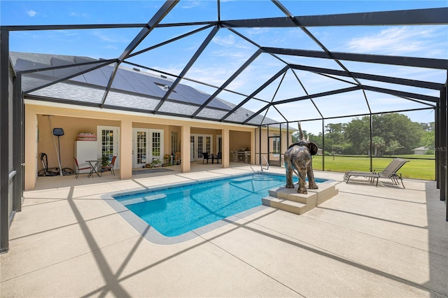 6573 S Magnolia Ave, Ocala, FL 34471 - swimming pool with french doors, a patio, and glass enclosure