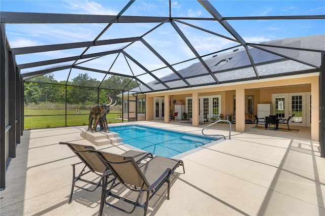 6573 S Magnolia Ave, Ocala, FL 34471 - swimming pool featuring french doors, a patio area, and a lanai