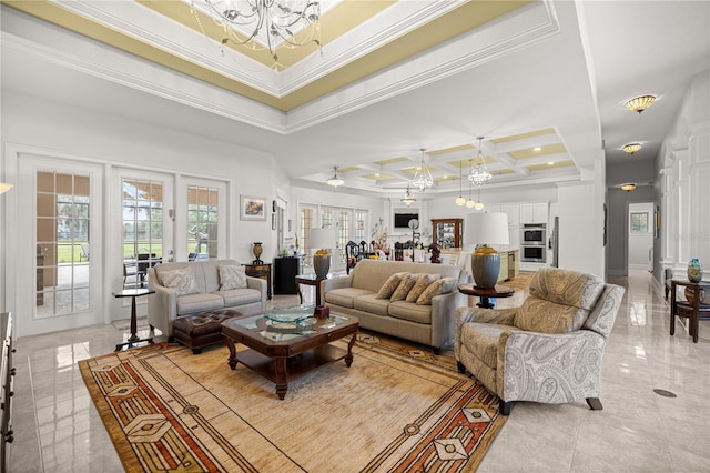 6573 S Magnolia Ave, Ocala, FL 34471 - living area with a chandelier, coffered ceiling, ornamental molding, light tile patterned flooring, and french doors