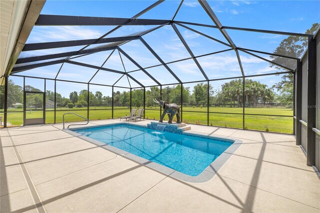 6573 S Magnolia Ave, Ocala, FL 34471 - swimming pool featuring a patio, a yard, and glass enclosure