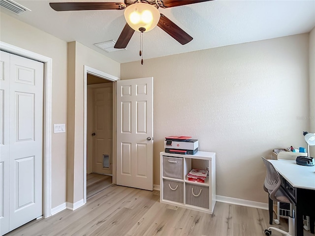 6812 Gideon Cir, Zephyrhills, FL 33541 - bedroom with light wood-type flooring, baseboards, and ceiling fan