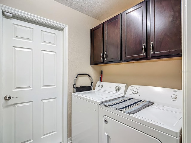 6812 Gideon Cir, Zephyrhills, FL 33541 - laundry room with washing machine and clothes dryer, cabinet space, a textured ceiling, and a textured wall
