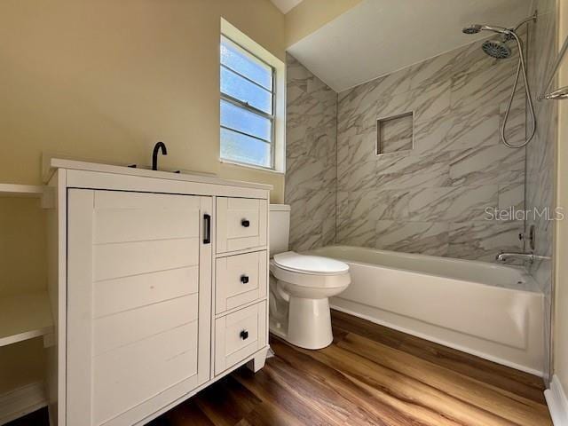 8770 SW 196th Terrace Rd, Dunnellon, FL 34432 - full bath featuring toilet, shower / bath combination, wood finished floors, and vanity