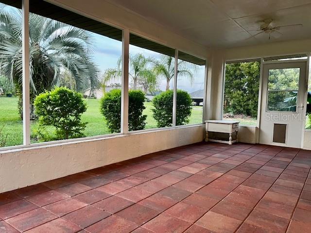 8770 SW 196th Terrace Rd, Dunnellon, FL 34432 - unfurnished sunroom with plenty of natural light