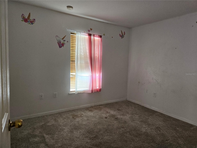 4460 SW 44th St, Ocala, FL 34474 - unfurnished room featuring carpet floors, a smoke detector, and baseboards