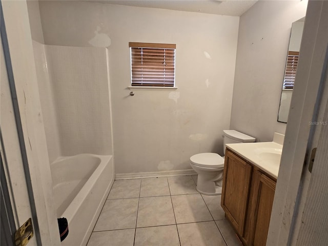 4460 SW 44th St, Ocala, FL 34474 - full bathroom featuring vanity, toilet, tile patterned floors, baseboards, and washtub / shower combination