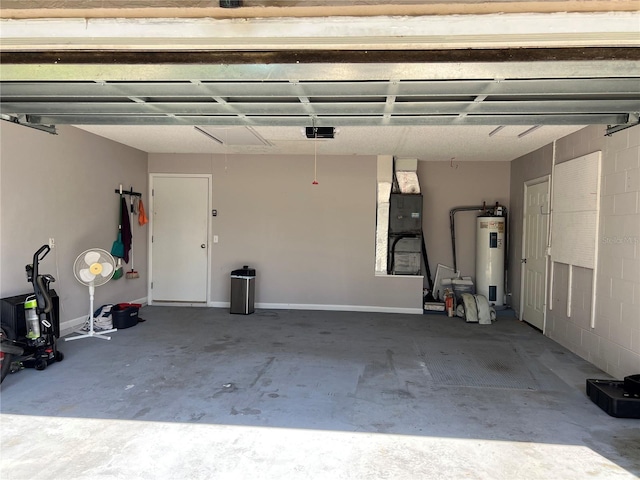 21 Pecan Course Cir, Ocala, FL 34472 - garage featuring water heater and a garage door opener