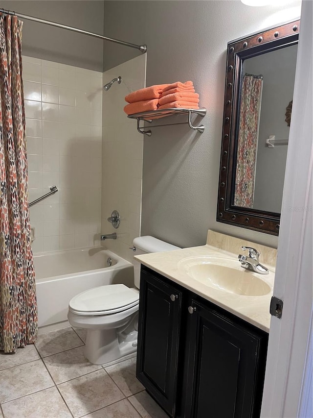 8447 SW 82nd Loop, Ocala, FL 34481 - bathroom featuring vanity, toilet, shower / tub combo with curtain, a textured wall, and tile patterned flooring
