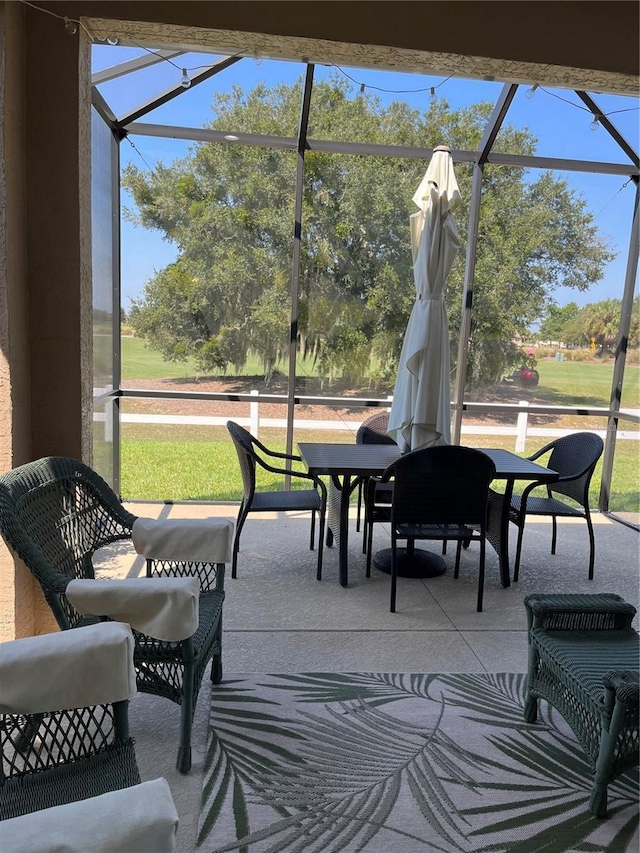 8447 SW 82nd Loop, Ocala, FL 34481 - sunroom / solarium with outdoor dining area and healthy amount of natural light